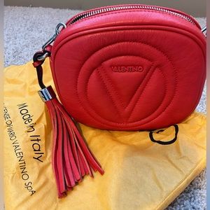 Valentino Red Crossbody bag comes with dust bag.